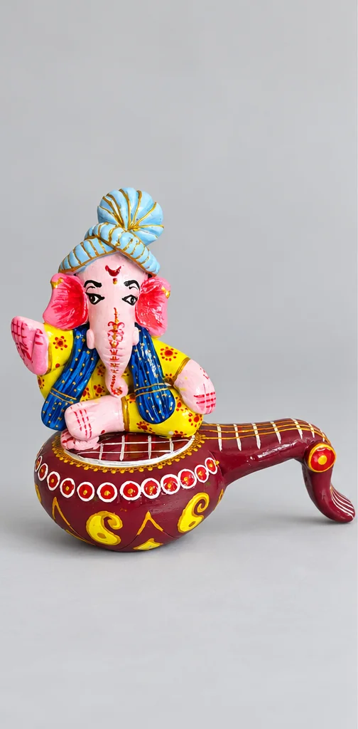 Sitar Melody Ganesha — studio product photograph