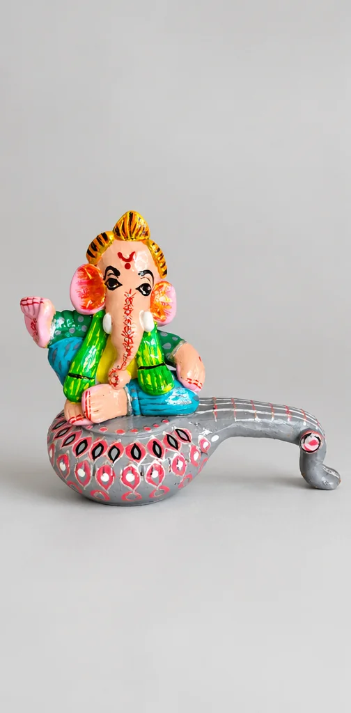 Silver Veena Ganesha — studio product photograph